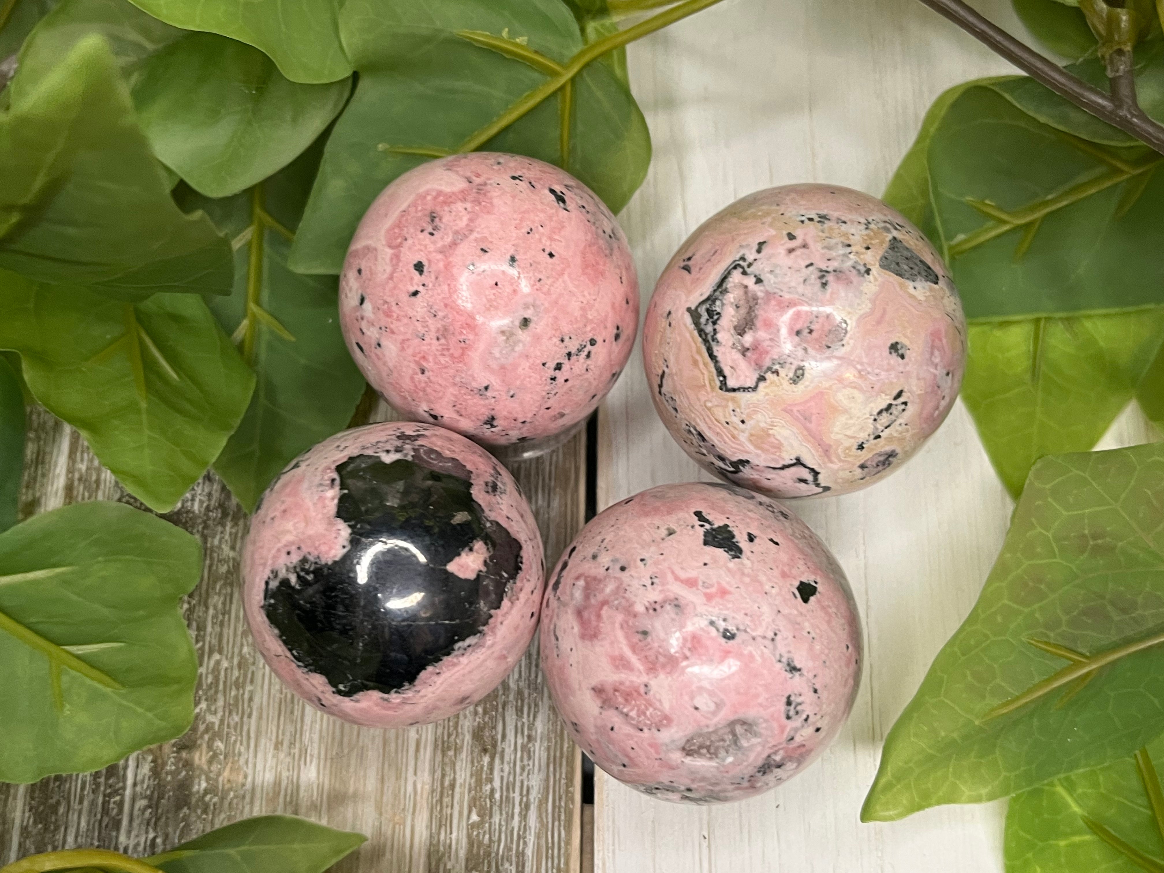 Peruvian Rhodonite Spheres – Happily Ever Crystals
